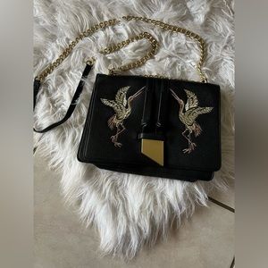 Foley and Corinna black purse